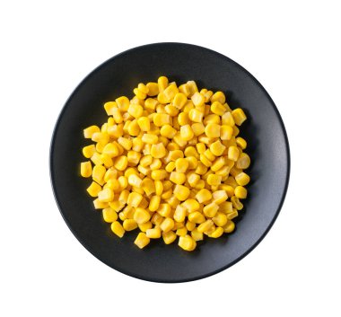 Beyaz arka planda izole edilmiş siyah seramik mısır taneleri..