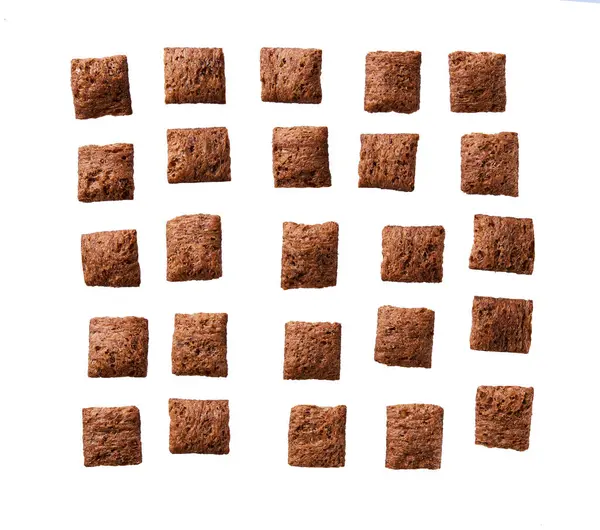 Beyaz arka planda izole edilmiş çikolata yastıkları.