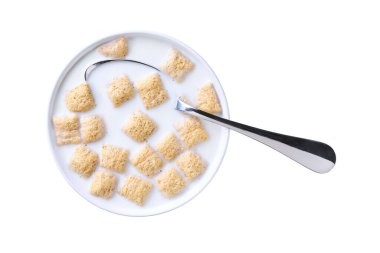 Sağlıklı kahvaltı, beyaz arka planda izole edilmiş bir kase mısır gevreği. Üst Manzara. Bir kase çıtır mısır gevreği ve yalnız süt..