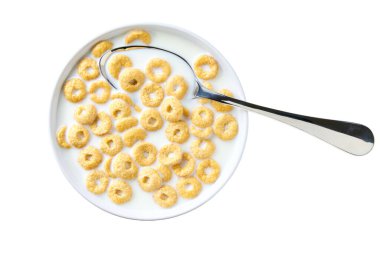 Sağlıklı kahvaltı, bir kase yulaf esaslı mısır gevreği ve beyaz arka planda izole edilmiş süt. Üst Manzara. Bir kase yulaf gevreği ve süt izole edilmiş..