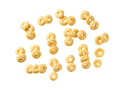 Yuvarlak yulaf tabanlı mısır gevreği beyaz arka planda izole edilmiş. gevrek yulaf döngüleri beyaz arkaplan görünümünde izole.