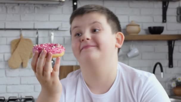 Fat Man Happily Eats Donut Kitchen Chubby Teen Eats Donut — Stock Video