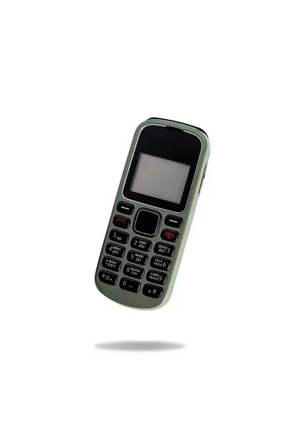 stock image Old mobile phone in white background