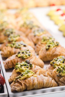 Italian Bakery counter, Window of desserts at a pastry shop. Fresh and tasty products. 