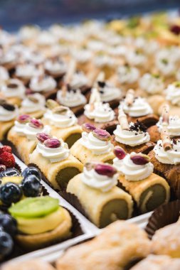 Italian Bakery counter, Window of desserts at a pastry shop. Fresh and tasty products. 