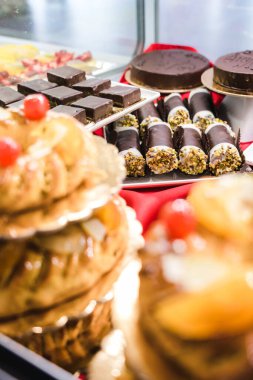 Italian Bakery counter, Window of desserts at a pastry shop. Fresh and tasty products. 