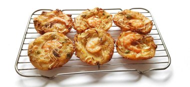 Bakwan udang or shrimp bakwan or bakwan Pontianak. Indonesian fried snack. Traditional street food clipart