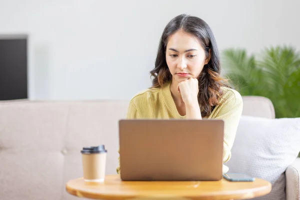 Stock image Recruitment Concept. Indian Asian Girl Browsing Work Opportunities Online, Using Job Search App or Website on Laptop, Copy Space