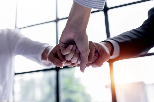 Stock image Business handshake for teamwork of business merger and acquisition,successful negotiate,hand shake,two businessman shake hand with partner to celebration partnership and business deal concept