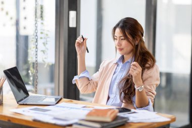 happy excited.Portrait of success business asian woman enjoy success with laptop on work desk. Authentic shot joyful asian girl got jackpot, Surprised and celebrating her victory.