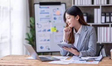 Business Documents, Auditor business Asian woman checking searching document legal prepare paperwork or report for analysis TAX accountant Documents data contract partner deal in the workplace office