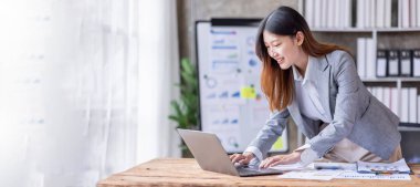 Business Documents, Auditor business Asian woman checking searching document legal prepare paperwork or report for analysis TAX accountant Documents data contract partner deal in the workplace office