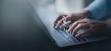 Business man or customers show satisfaction through the application on the laptop screen. By giving the most or the best satisfaction rating.Customer service satisfaction survey concept