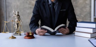 Lawyer working in office. Statue of justice, Law, legal services, advice, justice and law concept