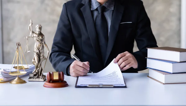 Lawyer working in office. Statue of justice, Law, legal services, advice, justice and law concept