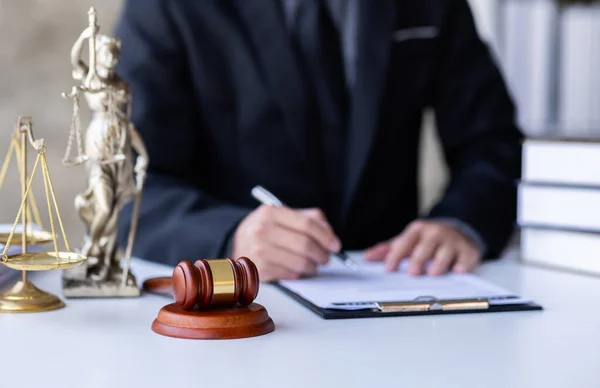 Lawyer working in office. Statue of justice, Law, legal services, advice, justice and law concept