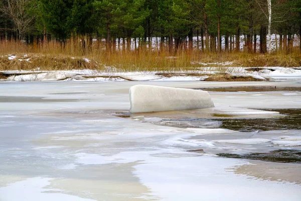 Spring is coming in Latvia. The ice is breaking on the river. A piece of ice has turned upright. The longest river in Latvia, Gauja.