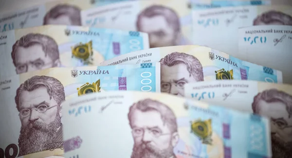 stock image Close up 1000 Ukrainian money hryvnia on white background. Business flat lay with copy space for text. Crisis and problem of financial turbulence, inflation, devalvation, economics depression.