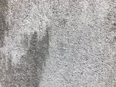 Boş gri ve siyah beton alçı duvar dokusu, pürüzlü doku beton duvarlı arka plan.