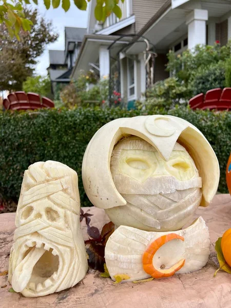 art carving of vegetables and fruits Carved different characters and faces on a pumpkin Halloween decorations for autumn harvest festivals Interesting creative ideas Table decorations and building