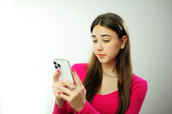 Fun Emotions Joy Young Woman Girl Looks Interestedly Phone Horizontally — Stock Photo, Image