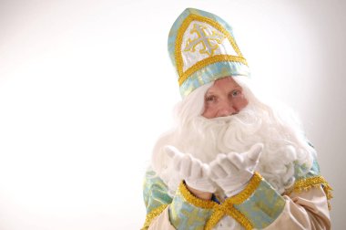 İki elle öpücükler yolluyor Sinterklaas 'a sürpriz bir Noel Baba Aziz Nicholas Noel' i anlatıyor yeni yıl avucunun içinde bir şey yok reklam için bir yer koyabilirsin