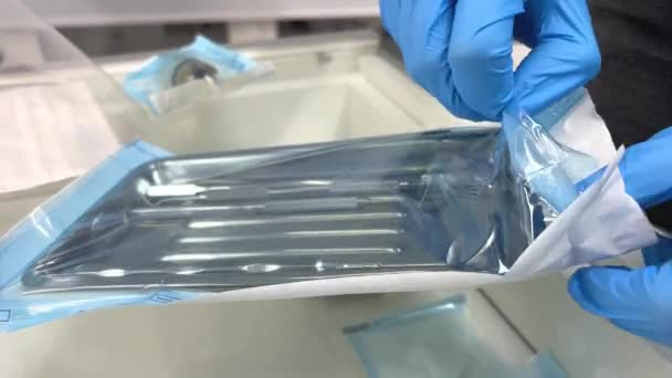 Unpacking Sterile Instruments Lie Transparent Neatly Folded Bags Various Devices — Vídeos de Stock