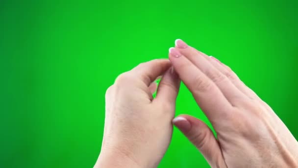 Hands Adult Woman Close Frame Green Background Chroma Key Examining — Vídeos de Stock