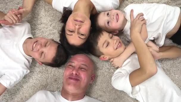 Happy Family Holding Carpet Clasped Hands Homeupper View Family Four — Wideo stockowe