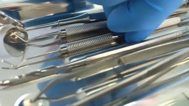 Unrecognizable Dentist Doctor Blue Sterile Glove Holding Dental Tools Hand — Stock videók