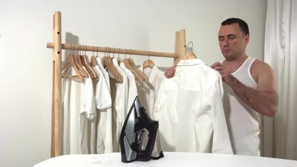 Man Finished Ironing Shirt Showing Thumb Class Likes Result Work — Wideo stockowe