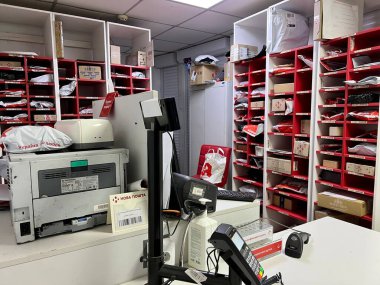 new post office post office different delivery parcels are stored envelopes cash register terminal no people computer everything to pick up parcels Ukraine Vinnytsia 14.01 2023