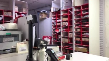new post office post office different delivery parcels are stored envelopes cash register terminal no people computer everything to pick up parcels Ukraine Vinnytsia 14.01 2023