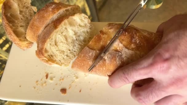 Man Metal Knife Tries Cut Ciabatta Bread French Loaf Very — Vídeo de stock