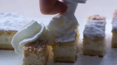 slow motion Full HD 240fps cream poured on cheesecake cottage cheese casserole homemade cake delicious breakfast Healthy food calcium for kids beautiful dessert sprinkled with sesame seeds