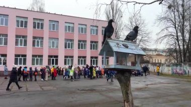 school children stand in line in a bomb shelter after a siren In the basement to hide from missiles and bombs Russia terrorist attacked Ukraine air raid offline war Ukraine Vinnitsia 19.01.2023