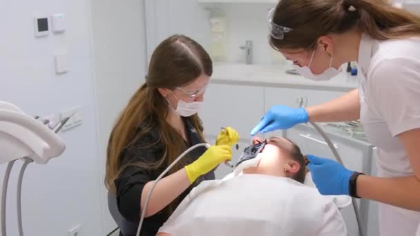 Modern Dental Equipment Medium Shot Female Dentist Mask Gloves Using — стоковое видео