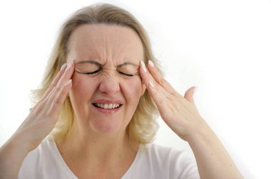 severe headache migraine woman holding hands temple eyes closed wrinkle forehead mouth ajar in meat disease cold coronavirus consequences white background medicine cure recovery