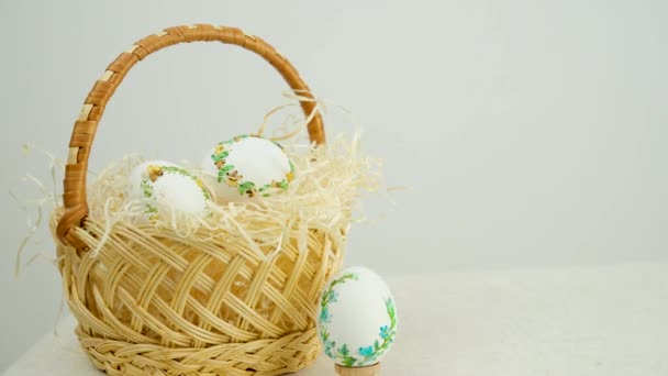 Easter Holiday Decorative Handmade Eggs Wicker Basket White Table White — Vídeo de Stock