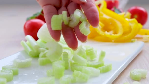 Celery Stalk White Cutting Board Yellow Bell Pepper Cherry Tomatoes — Stock video