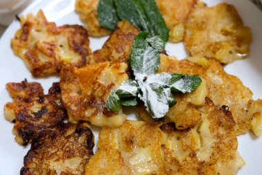 Fresh baked cookies is sprinkled powdered sugar. Shortbread dough, shortcake baking. Bakery products. large white rectangular plate High quality FullHD footage