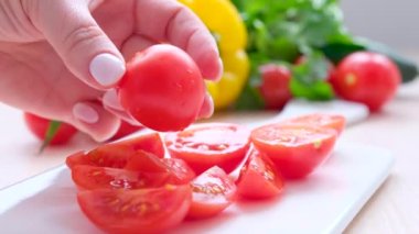 Delicious red tomatoes in Summer tray market agriculture farm full of organic. Fresh tomatoes, It can be used as background Chopped tomatoes on white background Ripe Tomatoes