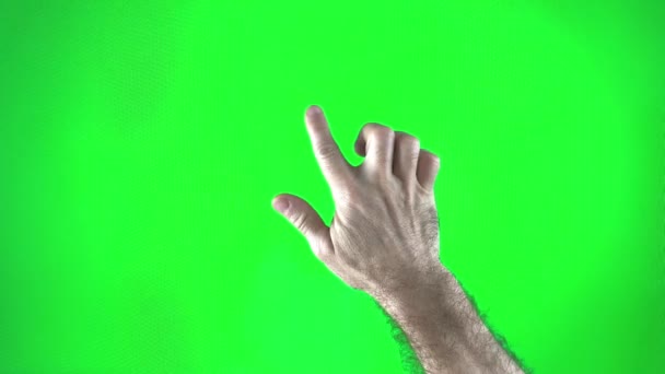 Зеленый Фон Мужской Волосатой Руки Переворачивает Невидимые Страницы Указательным Пальцем — стоковое видео