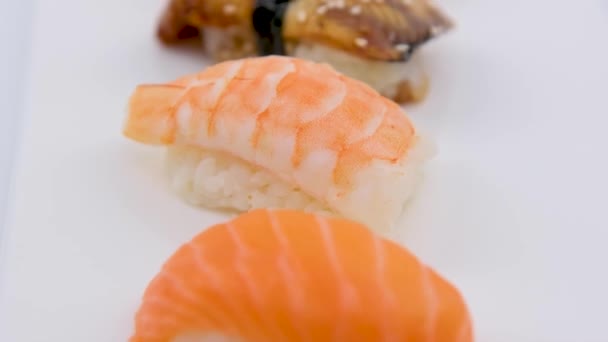 Sushi Set Sashimi Sushi Rolls Served White Slate Tuna Shrimp — ストック動画