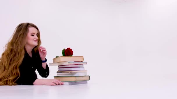 Studio Shot Smiling Schoolgirl Doing Her Homework Isolated White Background — стоковое видео