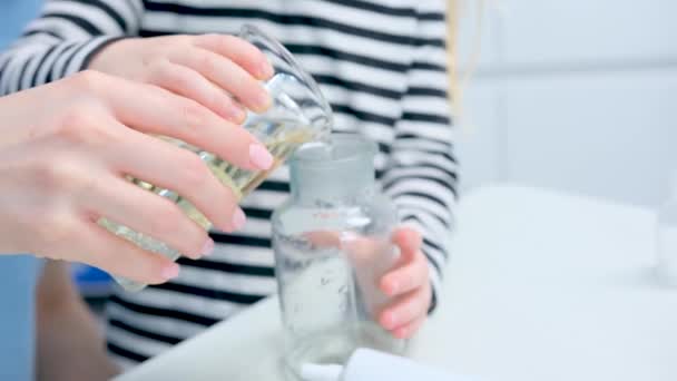 Hands Child Woman Small Stream Pour Sunflower Oil Mixed Water — Stok video