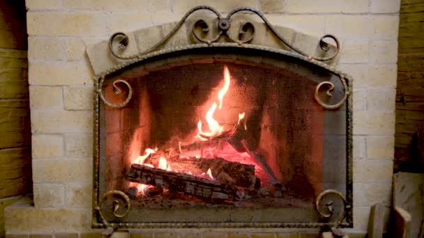 Classic Stone Fireplace Bright Flame Burning Wood High Quality Footage — стоковое видео