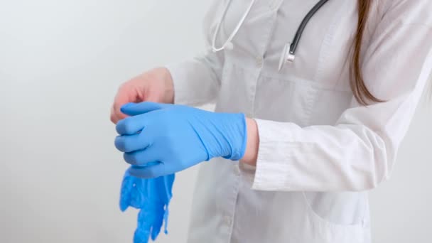 Close Scientist Hands Putting Nitrile Blue Latex Gloves Labcoat Wearing — Vídeo de stock