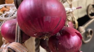 Full Frame Shot Of Purple Onions. Fresh whole onions. Rotation. High quality 4k footage