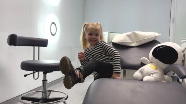 Visit Dentist Little Girl Child Climbs Dental Chair Joyful Smile — Stockvideo